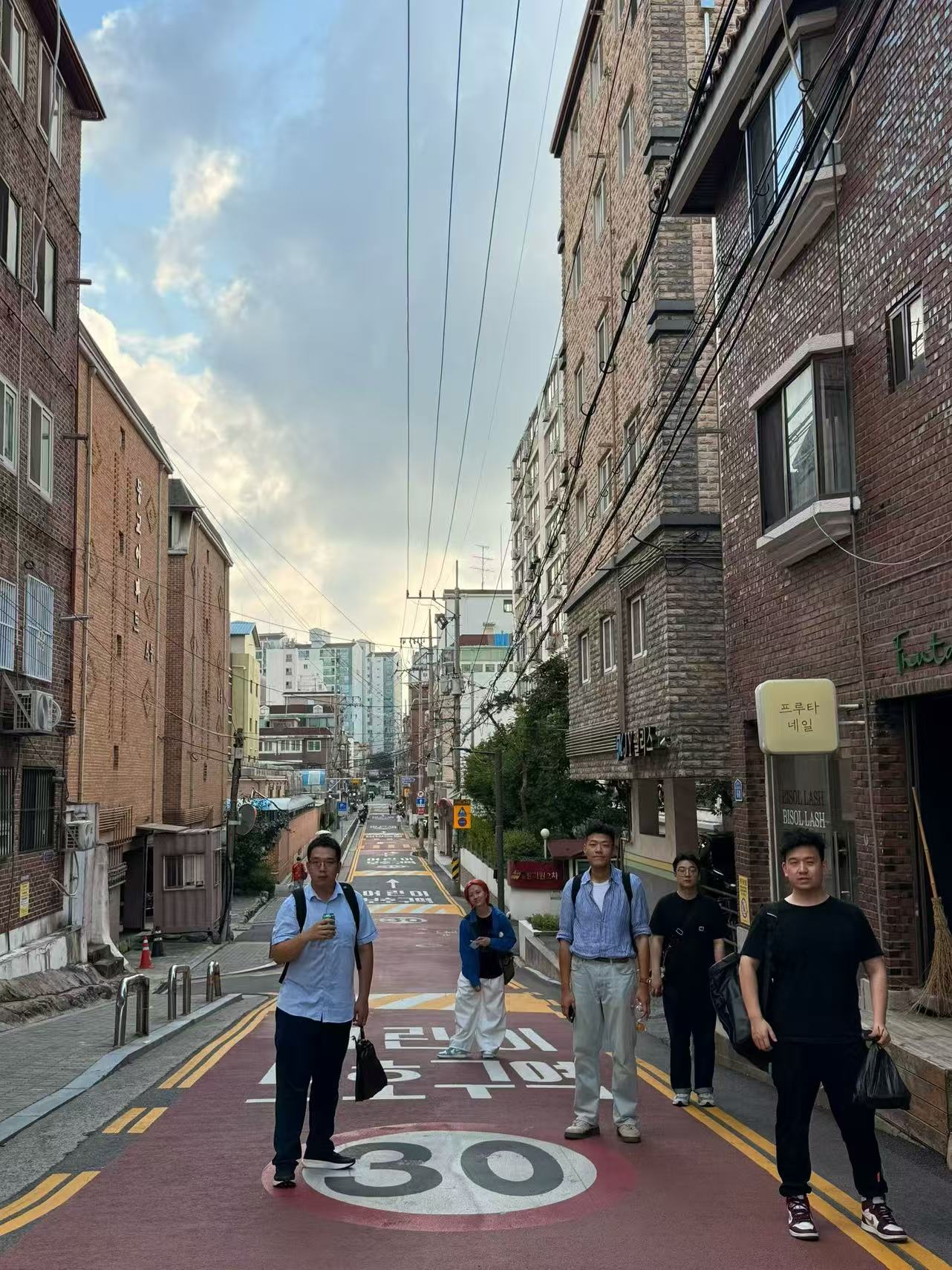 Walking through a Seoul neighbourhood street
